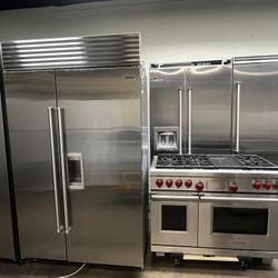 Wolf 48”Wide Dual Fuel Range And Sub Zero 48”Wide Built In Stainless Steel Refrigerator 