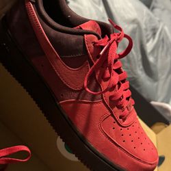 Reddish Black Nike High tops 