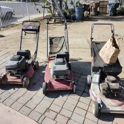 Three Toro Mowers