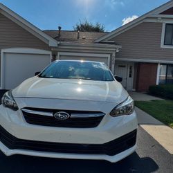 2022 Subaru Impreza · Hatchback · Driven 70,950 miles