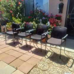 4 OFFICE CHAIRS. 3 THE SAME 1 LITTLE DIFFERENT. 