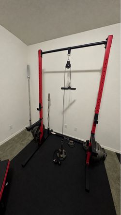 Home Gym Power Rack + 300 lb Olympic Weight Set + Olympic Bar + EZ curl bar + Pulley System