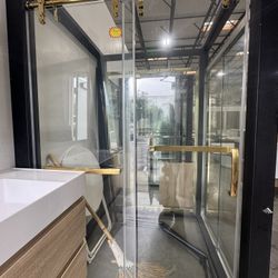 60 in. W x 76 in. H Single Sliding Frameless Shower Door in Gold with 5/16 in. Tempered Glass #210  Approximate Max Installed Width (in.) 61.42 in. Do