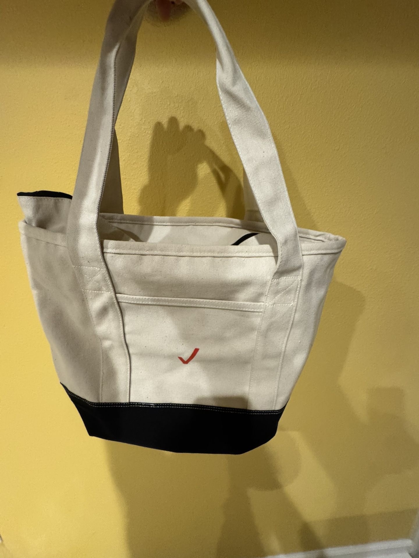 Verizon beige tote bag