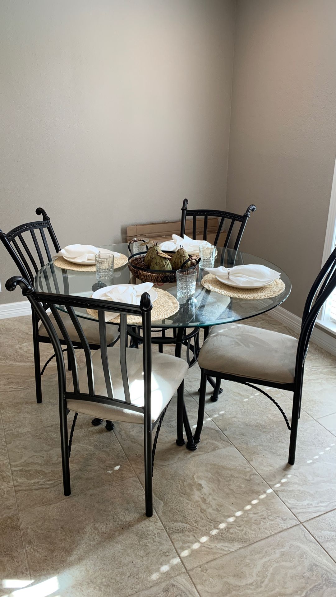 Glass and metal table and chairs