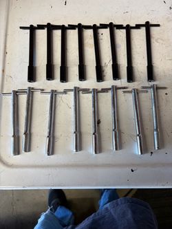 Valve cover hold downs