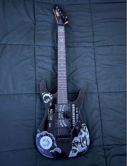 Custom “Ouija” Guitat
