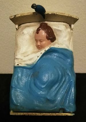 Photo VINTAGE 1930's - 1940's METAL BANK BABY IN CRADLE WITH BLUE BIRD OF HAPPINESS (MARKED MADE IN USA)