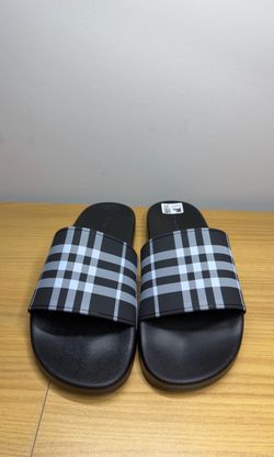 Black and white Burberry slides