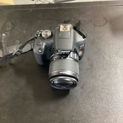 Canon EOS Rebel DSLR Camera with 18-55mm Lens