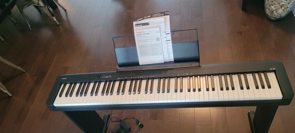 Keyboard: Casio SDP-S100 with Stand, 88 Weighted Keys, and Pedal