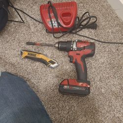 Milwaukee drill and charger