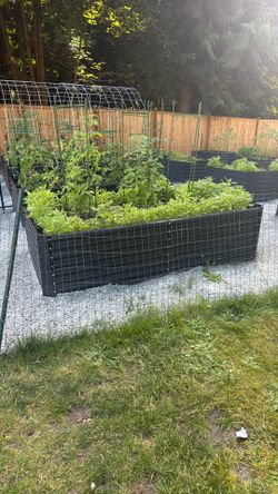 2 unopened garden boxes 4x8x3