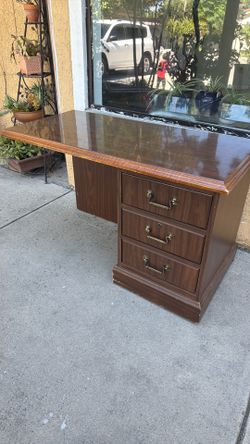 Wooden desk with drawers