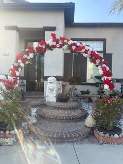 Gold tone gate for wedding, no flowers included .