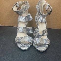 Snake Print Heels. Item No 602 (Shopgoodwill)