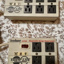 Two Tripp lite surge protector outlets 
