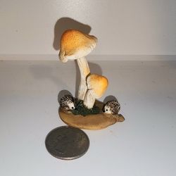 miniature fairy garden and terrarium Hedgehog and mushrooms 