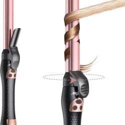 Rotating Curling Iron ( Brand New )