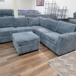 New 3pc Sectional And Ottoman In Dark Grey 