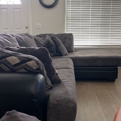 charcoal grey and black sectional