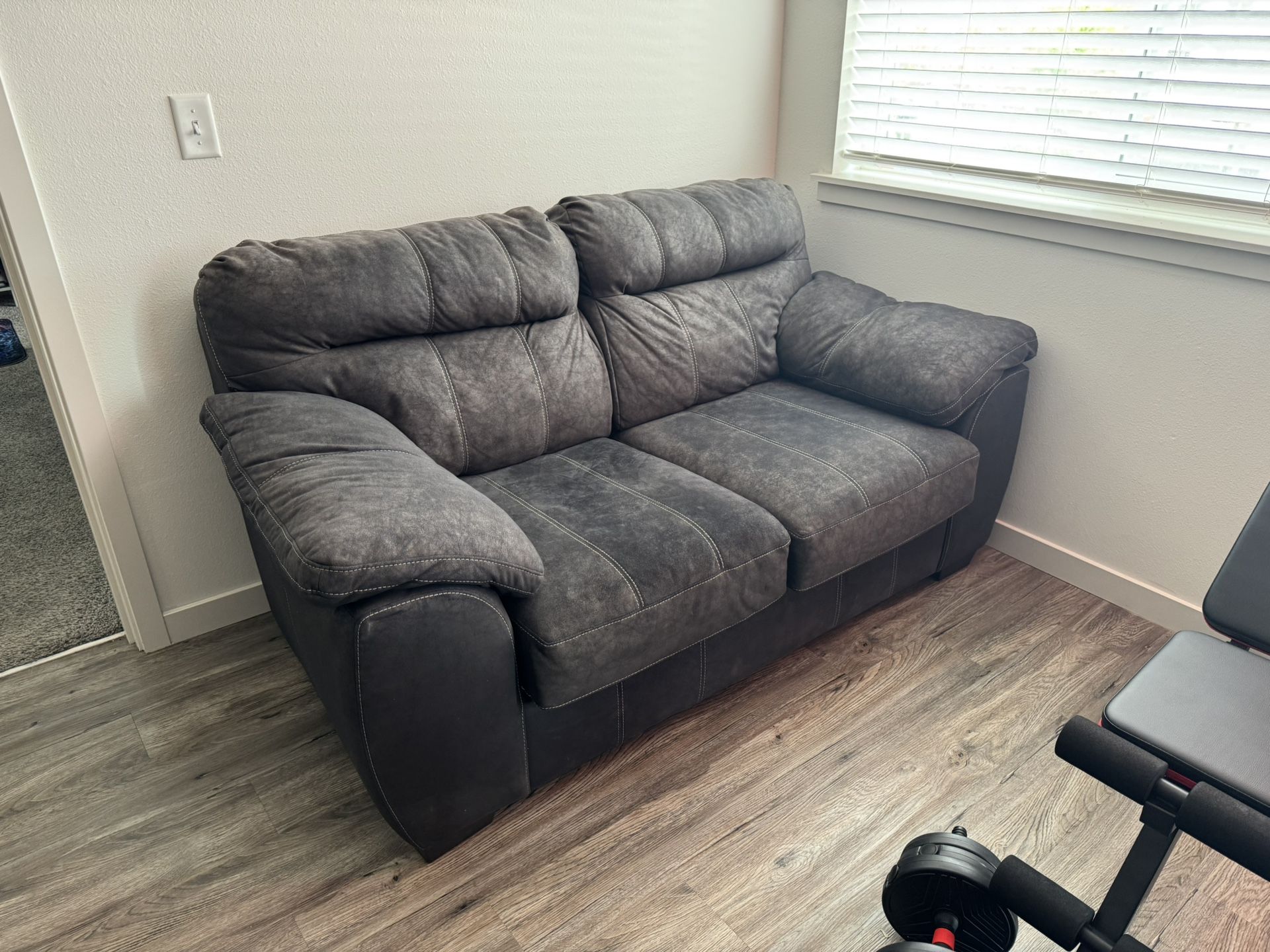 Brown loveseat 
