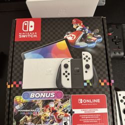NINTENDO SWITCH OLED LIKE NEW WITH LESS THAN 15 Hours Of Gameplay On It. 