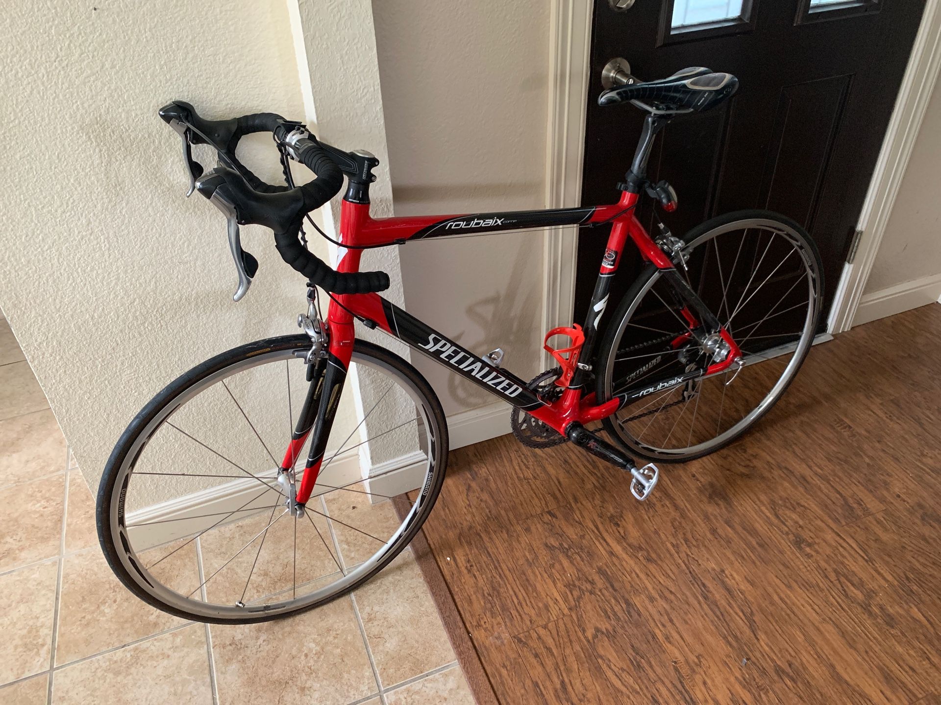 Roubaix Specialized Road Bike with Multiple Spare Parts and Safety Items