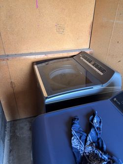 Washer and dryer gently used, has connection for washer and hose for dryer,
