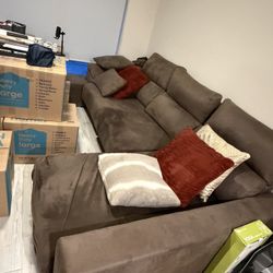 Taupe sofa with chaise lounge and two footrests. Moving sale!