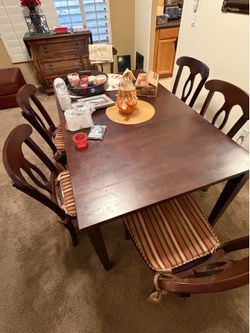 Brown dining room set, and 6 chairs
