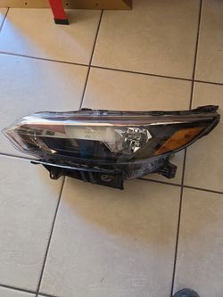 2025 Nissan central left headlight