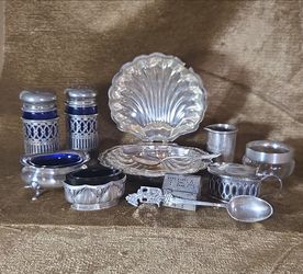 Vintage 10 piece mixture of silver, silverplate, cobalt blue glass, salt dips, relish dish, salt & pepper shakers, collector spoon, tea house. Nice co