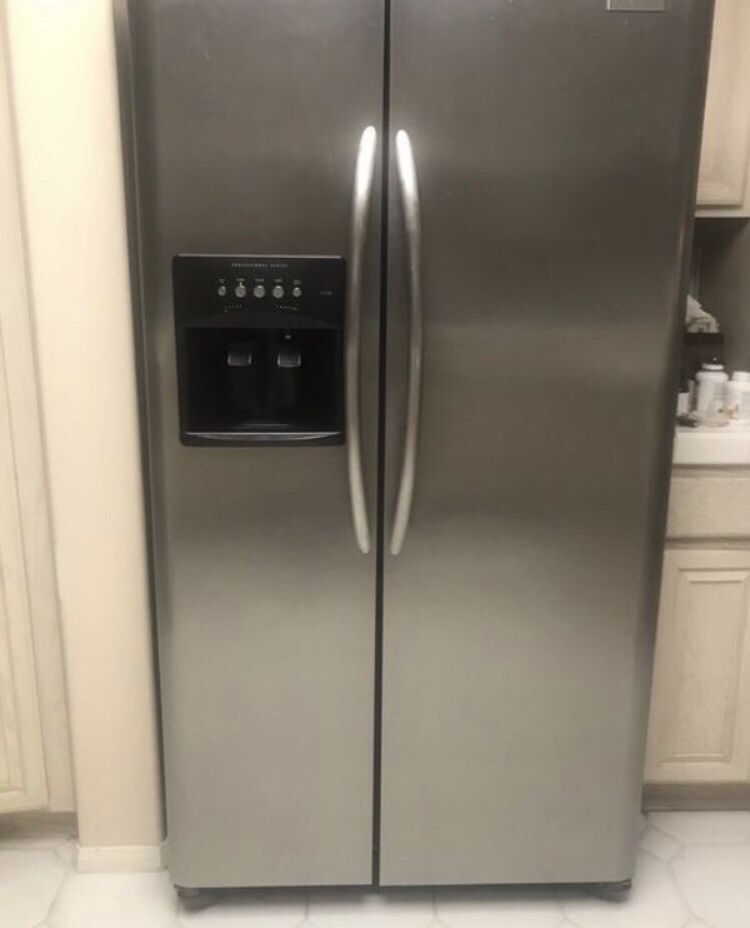 Frigidaire Refrigerator Side by Side Ice Maker Stainless Steel 69 Height x36 wide x 32 depth.