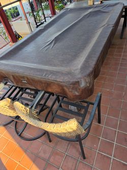 Pool table with balls and stick
