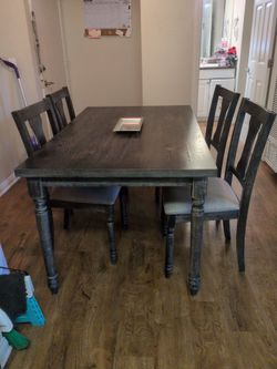 Dining room table with four chairs