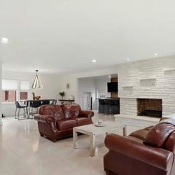 Brown leather couches $600 obo smoke free home