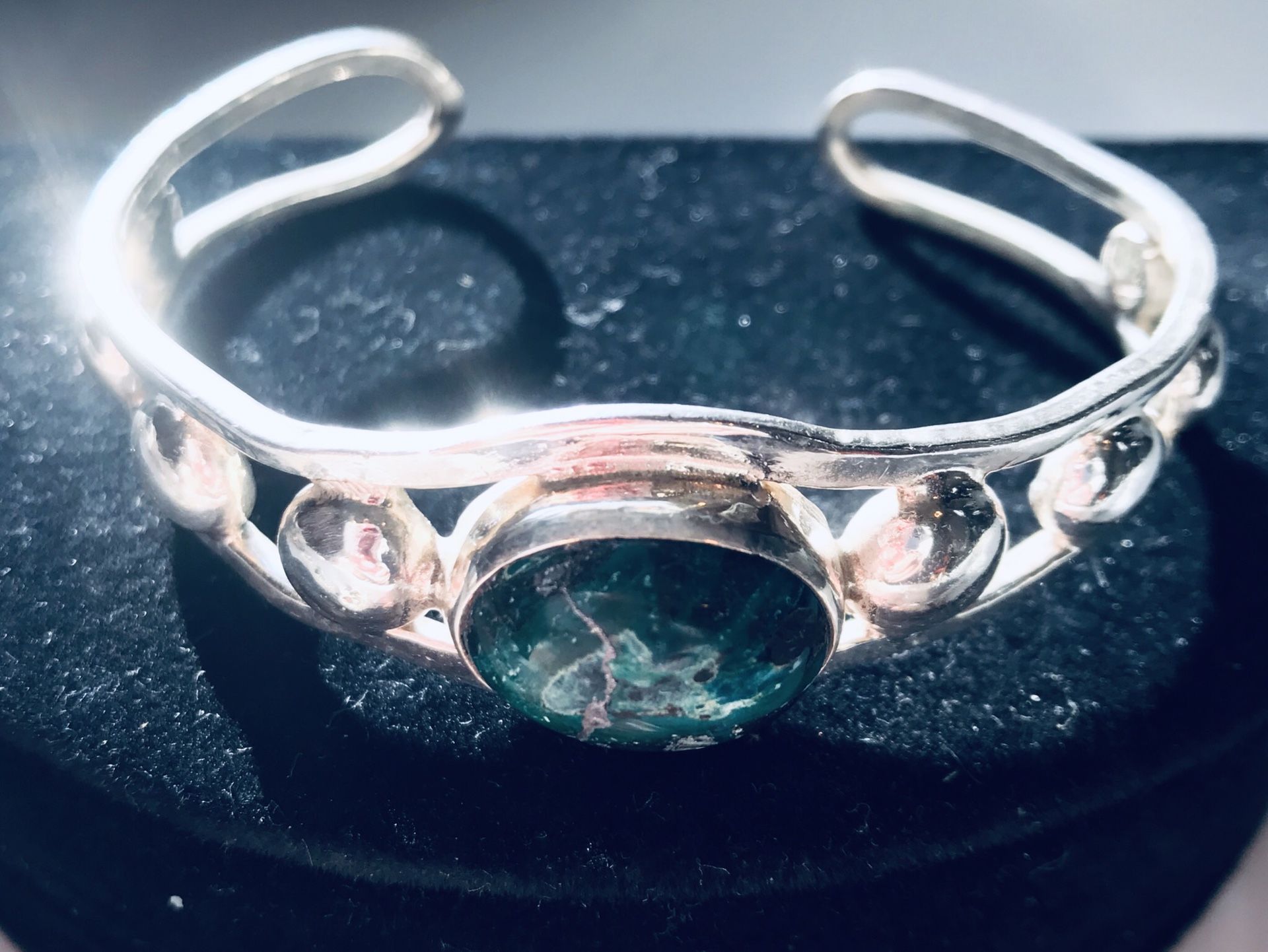 Heavy sterling silver cuff with a large beautiful mineral