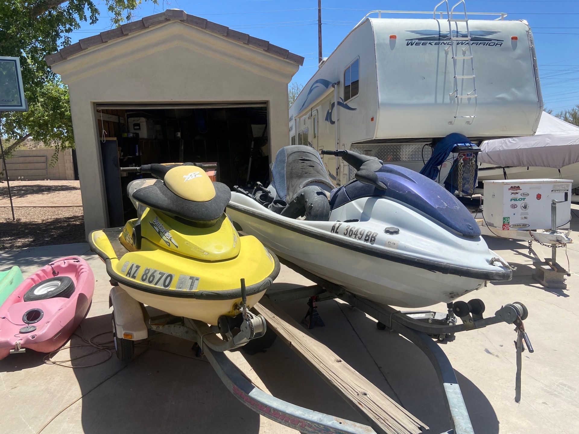 yamaha and seadoo jet ski with trailer
