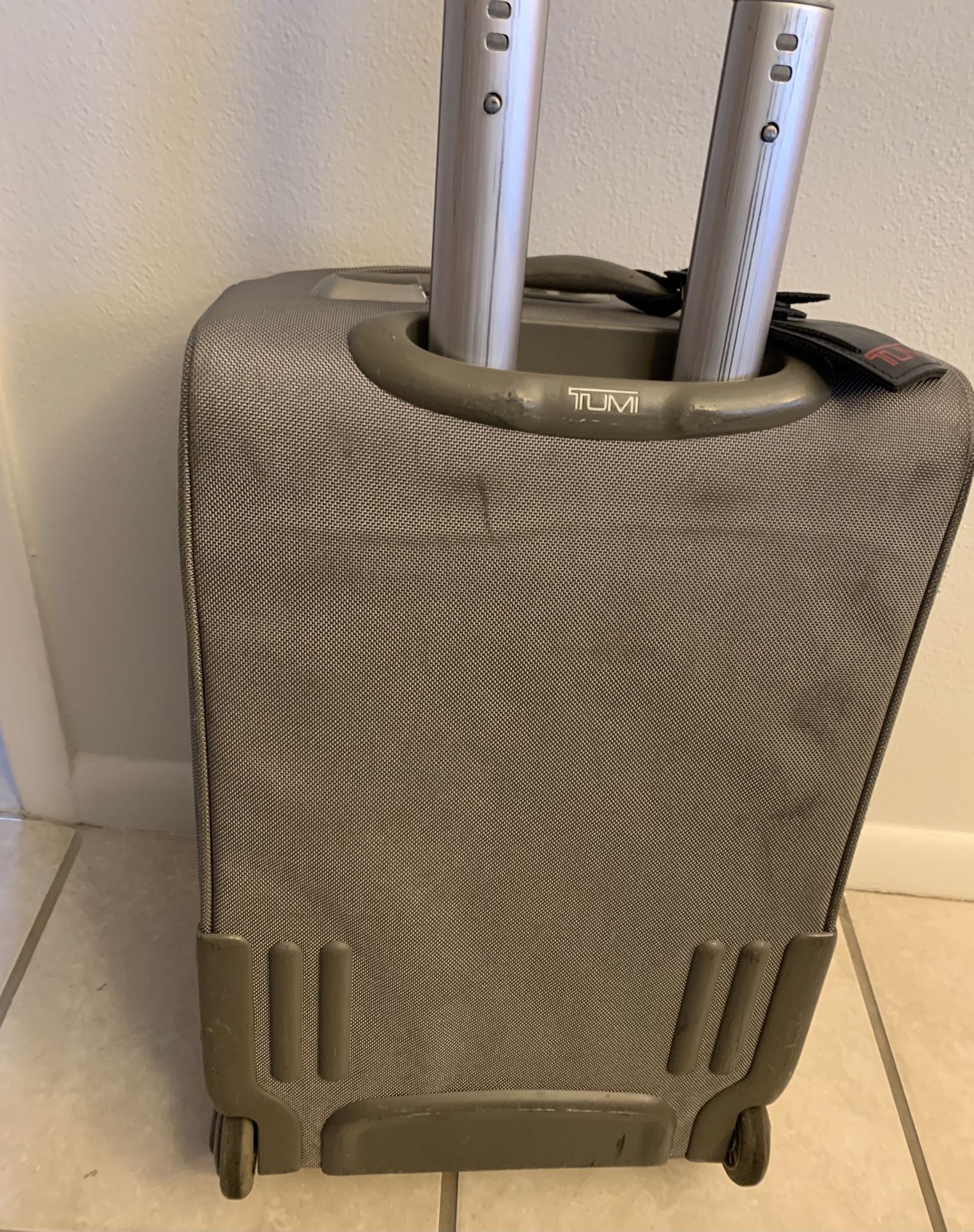 Tumi Carry On luggage