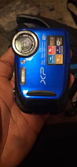 Fujifilm FinePix XP80 Digital Camera: 16.4 Megapixel CMOS sensorDurability: Waterproof (15m/50ft), shockproof (1.75m/5.8ft), freezeproof (-10°C/14°F),