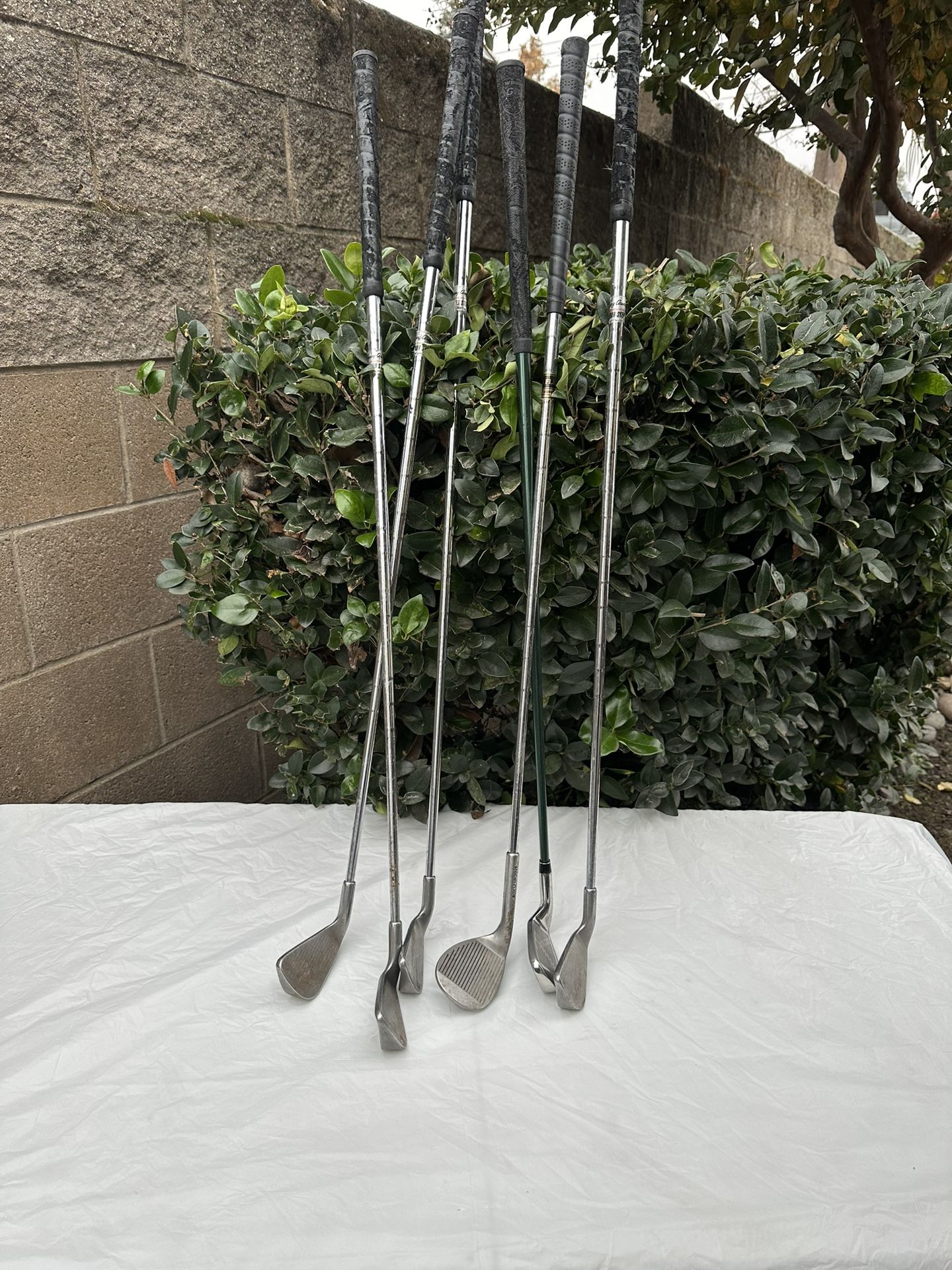 6 golf clubs