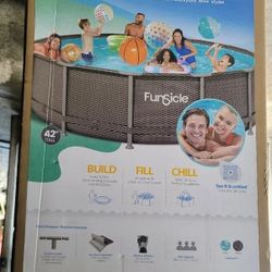 14 42" Pool with filter, pump, ladder.  New in box. 
