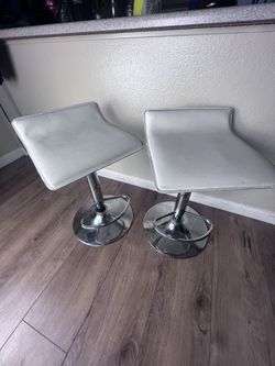 Two White Adjustable Chairs