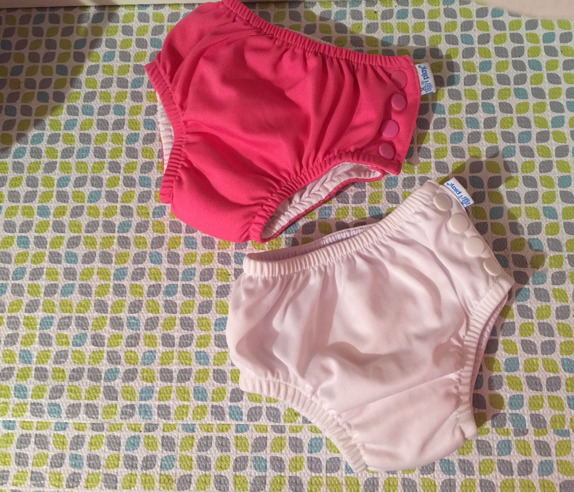 Snap Reusable Swimsuit Diaper / 6 months 10 -18 pounds baby / in new condition/ $10 for Both- 🦁✨