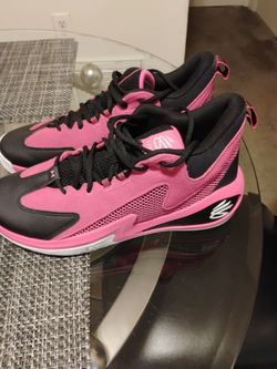 Pink Steph Curry high top tennis shoes
