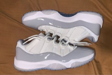 The Nike Air Jordan Retro 11 Low Cement Grey Sneakers in size 10 in good condition 9/10 only flaws really is dirty bottom    iare a stylish and comfor