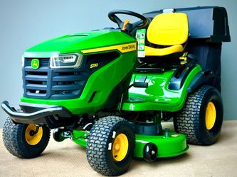Brand new John Deere S130 42-in 22 - HP V-twin Gas Lawn tractor with bagger included.