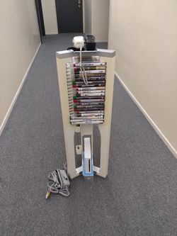 Wii Consoles With Games & Accessories