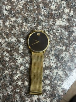 Movado MUSEUM CLASSIC 40mm yellow gold PVD-finished stainless steel case and mesh bracelet with a black-toned dial.